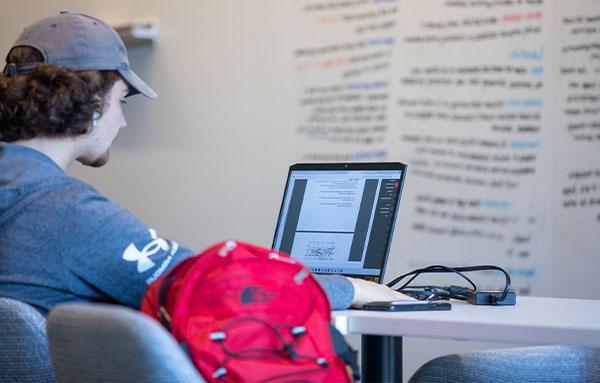 student working on computer