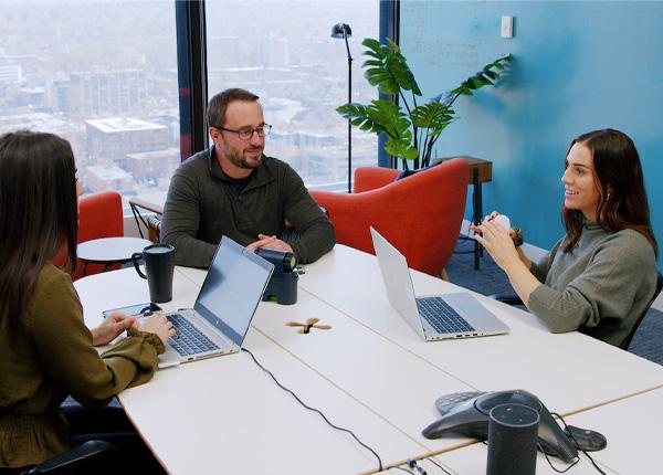 grad students having a meeting in office